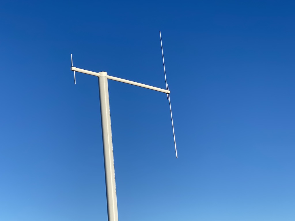 Two of my vertical dipole antenna against the sky. One for 2m and the other for 70cm.